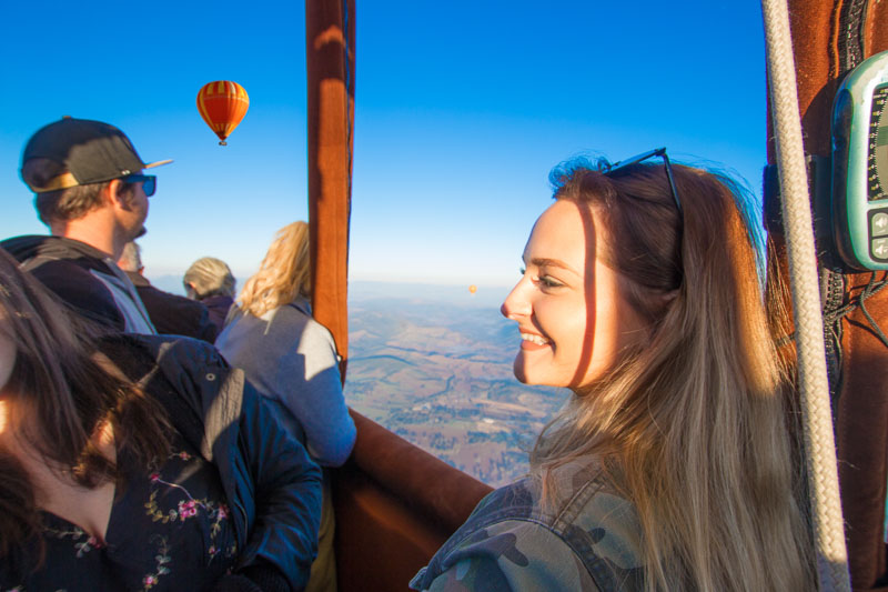 Smiling in the balloon basket