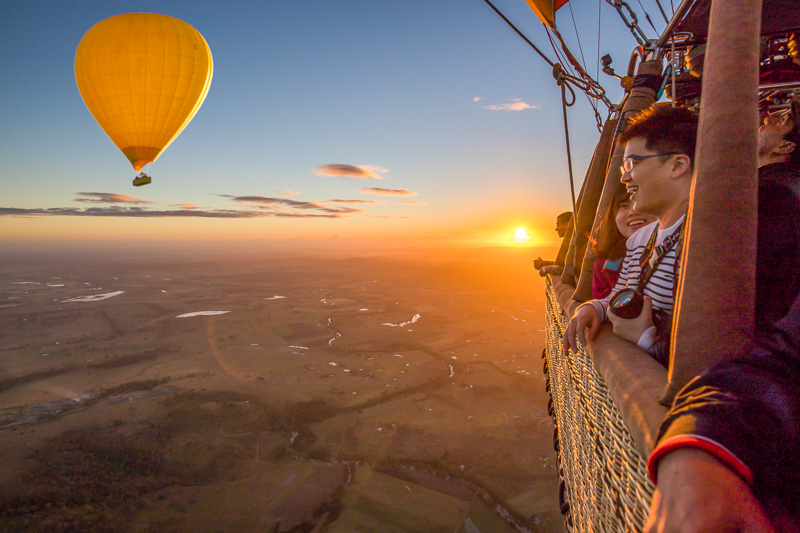 Gazing across from a basket to another balloon