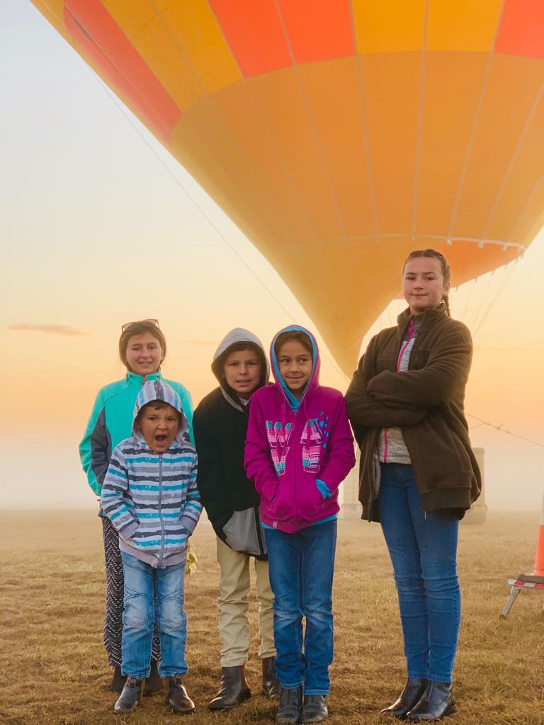 Kids flying in balloon